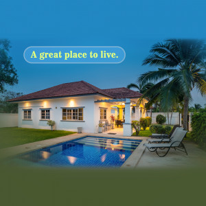 Beautiful single-story house with a swimming pool and tropical landscaping.