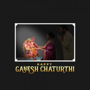 A couple performing a puja to Lord Ganesha during Ganesh Chaturthi