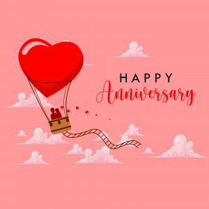 Red heart-shaped hot air balloon with a couple inside, celebrating an anniversary