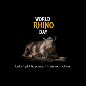Rhino lying down with World Rhino Day text