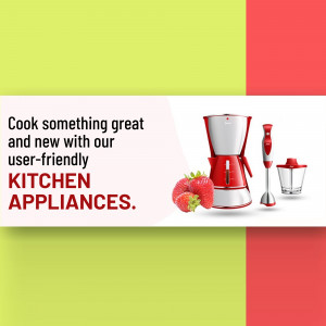 Red and white kitchen appliances including a blender and hand blender with strawberries