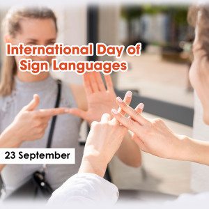 People communicating using sign language, celebrating International Day of Sign Languages.