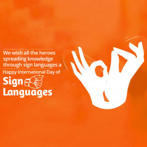 Hands forming the 'I Love You' sign in American Sign Language against an orange background with text celebrating International Day of Sign Languages.