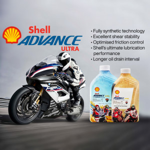 Shell Advance Ultra motorcycle oil with a racing motorcycle and rider