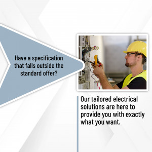 Electrician using a multimeter on an electrical panel