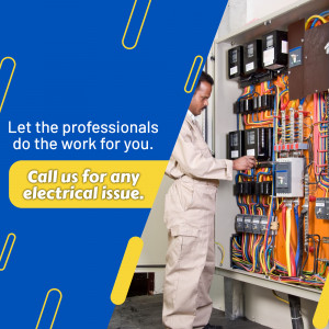 Electrician working on electrical panel