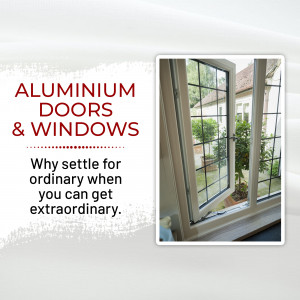 Close-up of an open aluminium window with text promoting aluminium doors and windows.