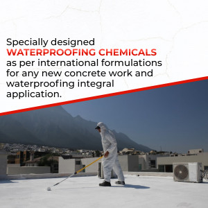 Worker applying waterproofing chemicals to a rooftop