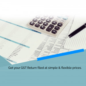 Calculator, pen, and financial documents representing GST return filing services.