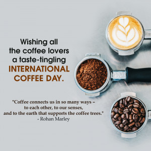 Coffee cup with latte art, coffee grounds, and coffee beans with a greeting for International Coffee Day.