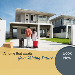 Couple with luggage standing in front of a new house
