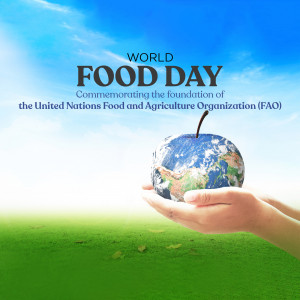 Hands holding an apple-shaped Earth for World Food Day
