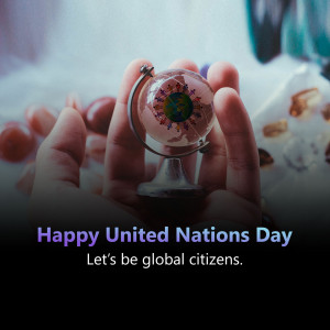 Hand holding a globe snow globe with the Earth inside, celebrating United Nations Day.