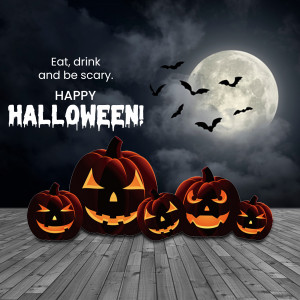 Halloween scene with carved pumpkins and a full moon