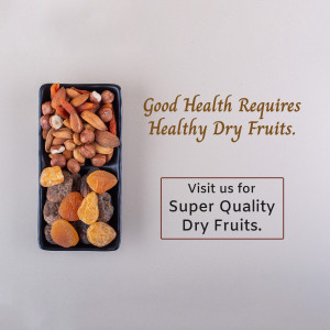 A black tray filled with a variety of dry fruits, with text promoting healthy eating and quality.