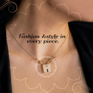 Close-up of a woman wearing a delicate golden necklace with a small padlock charm.