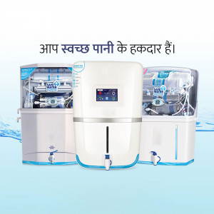 Three AquaSure water purifiers displayed against a blue water splash background with Hindi text.
