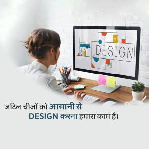 Woman designing on a computer with a modern workspace