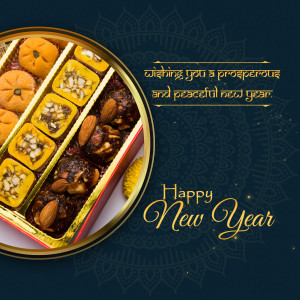 A box of assorted Indian sweets with a New Year greeting.