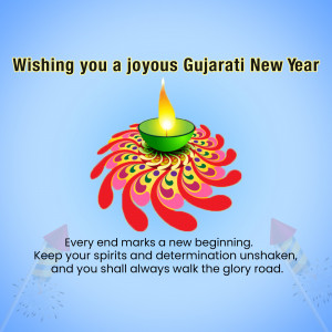 Gujarati New Year greeting with a lit diya and colorful floral design