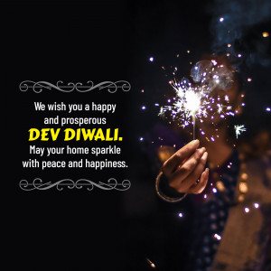 A person holding a sparkler with Diwali greetings.