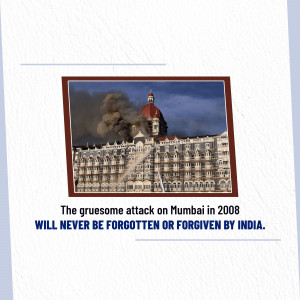 Image of the Taj Mahal Palace Hotel during the 2008 Mumbai attacks with a memorial text.