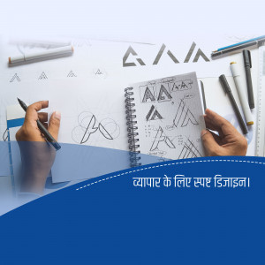 Hand sketching logo designs in a notebook with design elements around