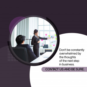 Woman presenting a business strategy to a colleague in a modern office.