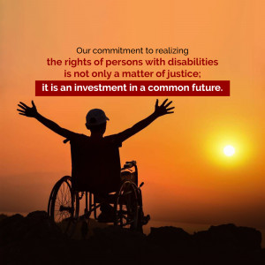 Silhouette of a person in a wheelchair with arms raised against a sunset, with text about disability rights.
