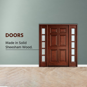 A close-up of a beautiful wooden door with glass panels.