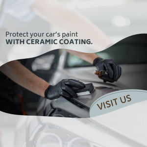 Professional applying ceramic coating to a car's paint
