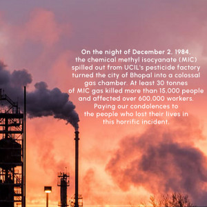 Image depicting the Bhopal gas tragedy with smoke billowing from factory chimneys against a fiery sunset.