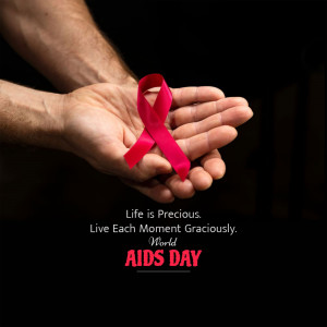 Hands holding a red ribbon for AIDS awareness