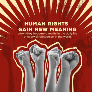 Image of raised fists with the text 'Human Rights Gain New Meaning'
