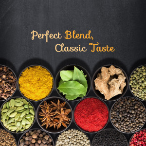 Assortment of colorful spices in small bowls on a dark background