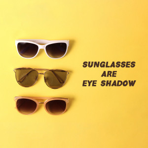 Three pairs of sunglasses on a yellow background with text 'Sunglasses are eyeshadow'