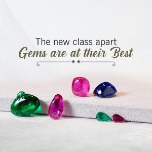 Assortment of colorful gemstones on a textured surface