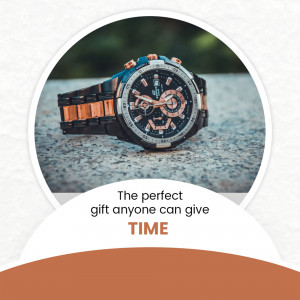 Close-up of a stylish wristwatch with a black and gold band on a stone surface.