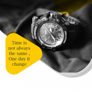 Close-up of a black G-Shock watch with a yellow graphic and text.