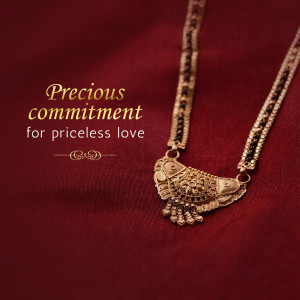 Close-up of a gold mangalsutra with intricate design on a red background