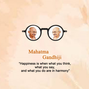 Portrait of Mahatma Gandhi with glasses and a motivational quote.