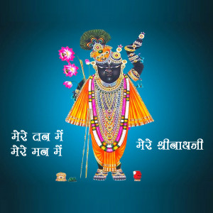 Image of Lord Shrinathji, a form of Krishna, adorned with flowers and jewelry.