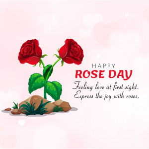 Two red roses with rocks and leaves, with 'Happy Rose Day' text