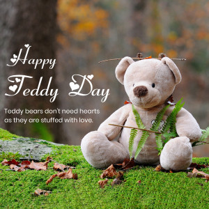 A teddy bear sitting on a mossy rock with a 'Happy Teddy Day' message.