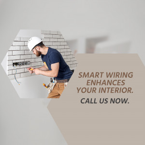 Electrician working on wiring in a home