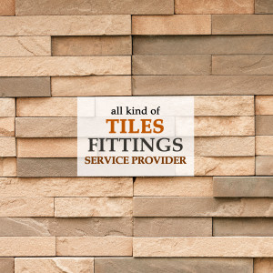Advertisement for tiles and fittings service on a textured wall