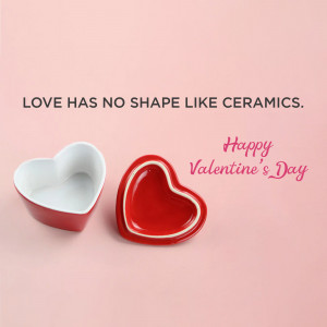Two heart-shaped ceramic dishes, one white and one red, on a pink background with Valentine's Day text.