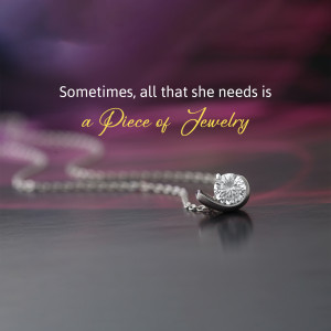 Close-up of a sparkling diamond pendant necklace on a dark surface with text overlay.