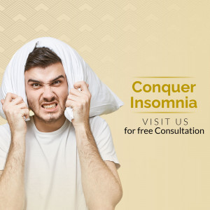 Man frustrated with insomnia covering his head with a pillow