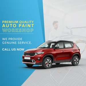 Red Kia Sonet car in an auto paint workshop